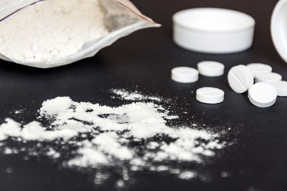 adderall and meth on table